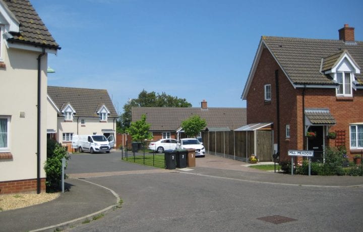 Ground Source Review: Flagship, Fressingfield - The street scene shows the diverse property make-up of the site, with the bungalows just visible to the rear.