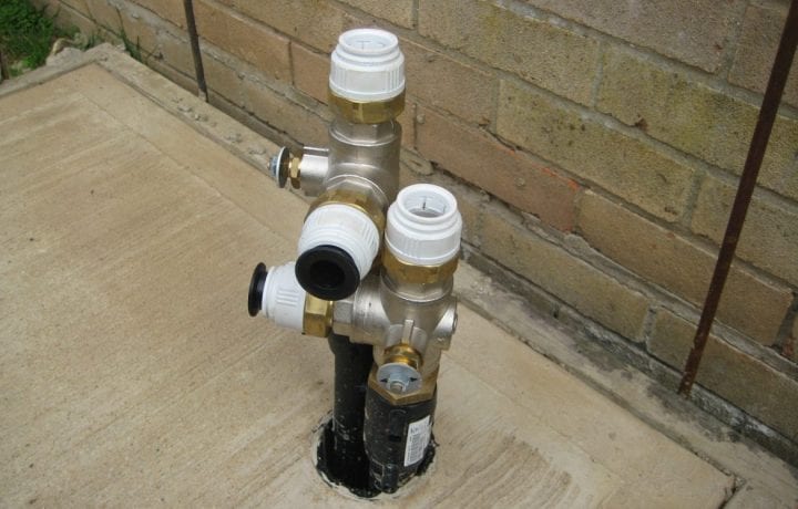 Ground Source Review: Hanover, Ashfield Court - Borehole header pipes to be connected to the heat pump