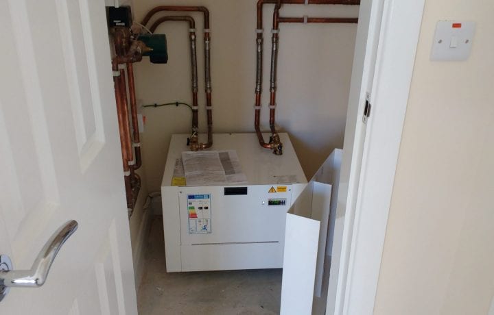 Ground Source Review: Shropshire Rural Housing, Llanymynech: Shoebox heat pump in cupboard