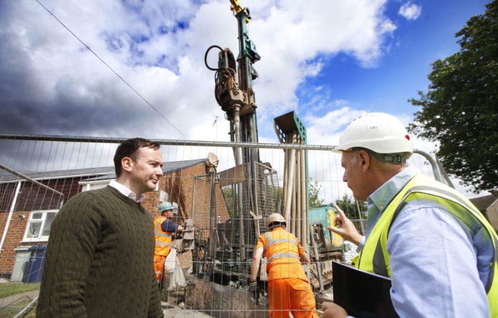 Cllr Tom Hayes and Richard Tams observe borehole drilling at the Blackbird Leys smart renewable heating project
